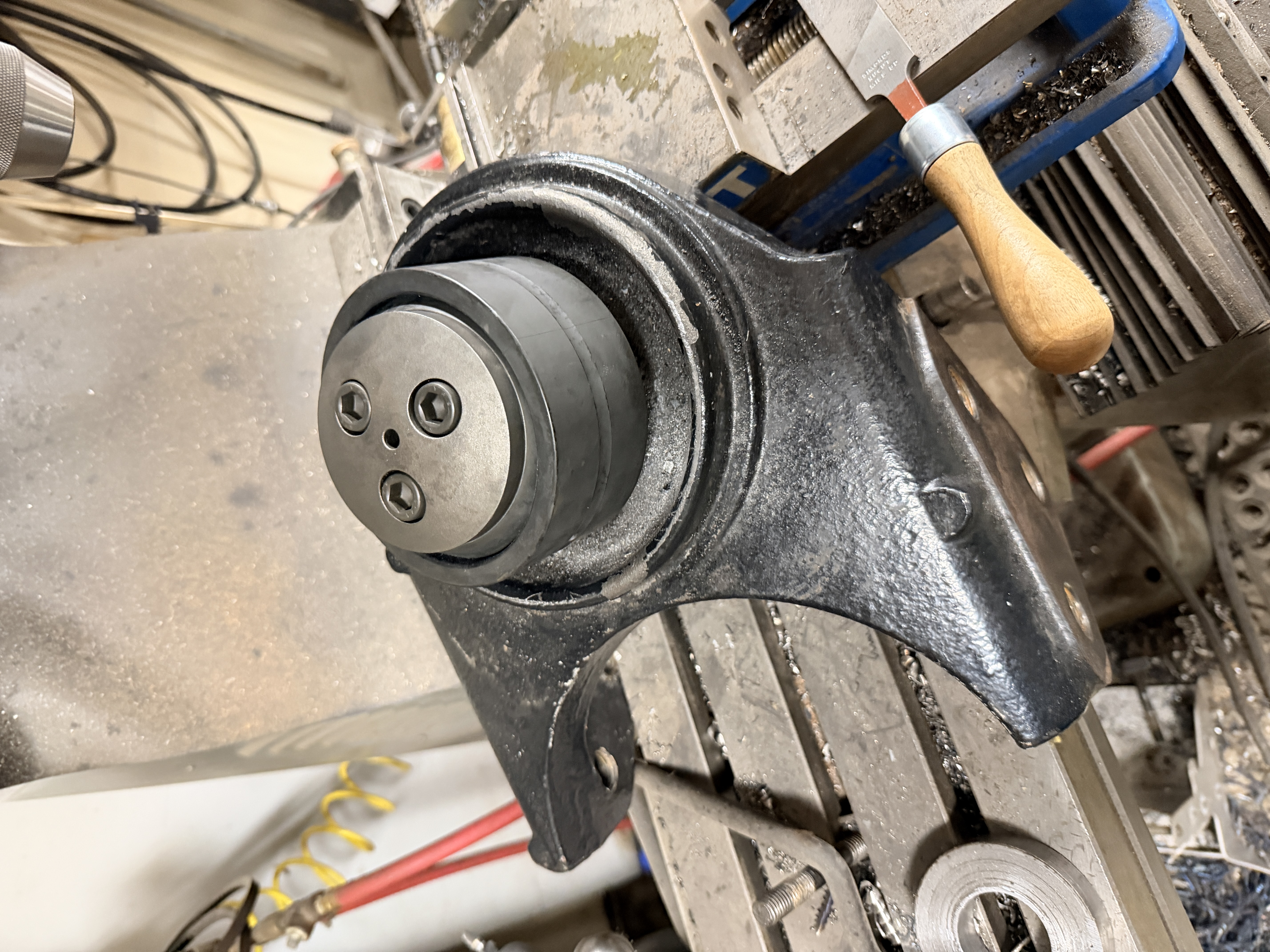 Cast iron housing with machined insert in mill
