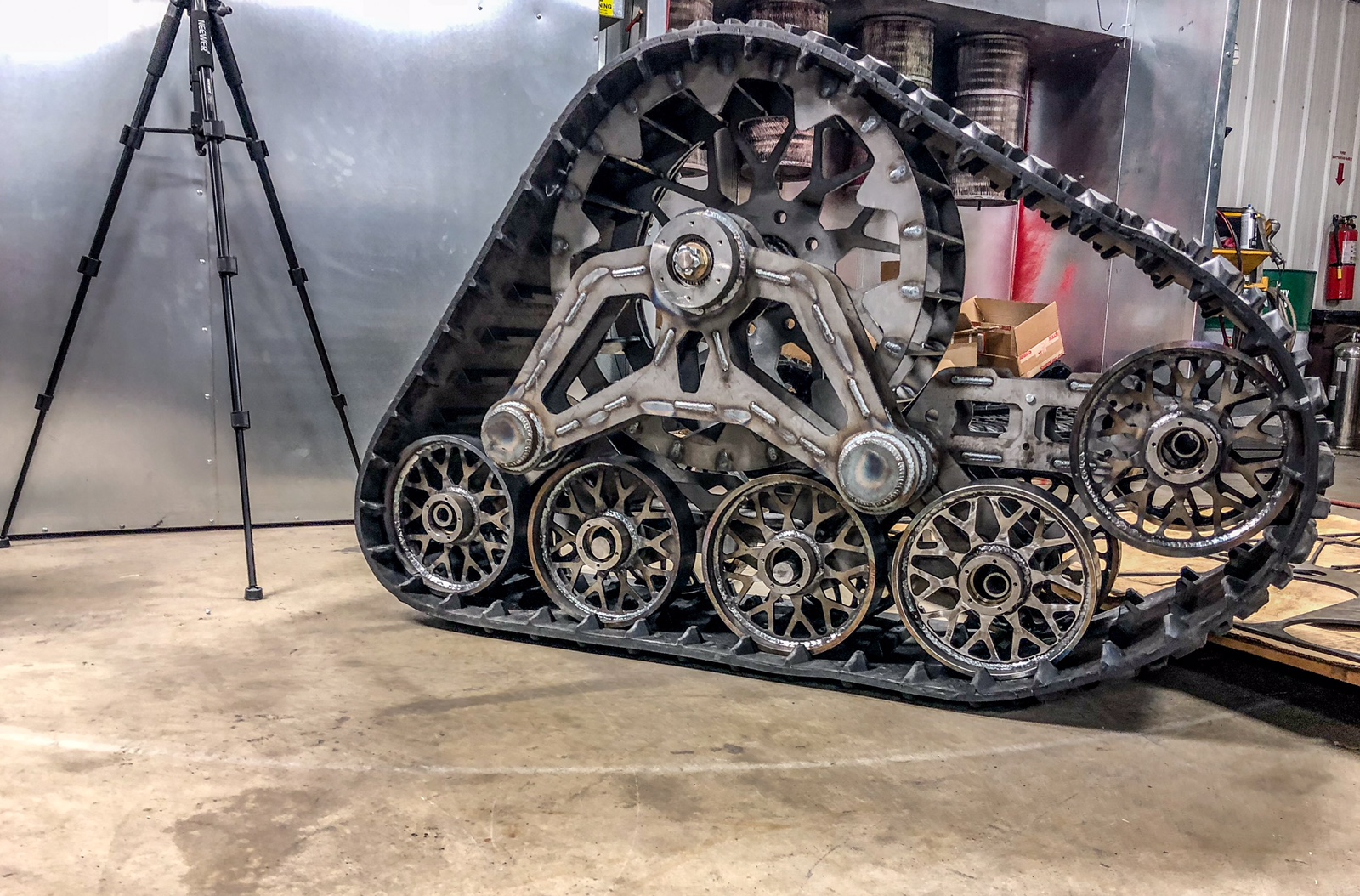 Complex machined and fabricated track assembly in shop